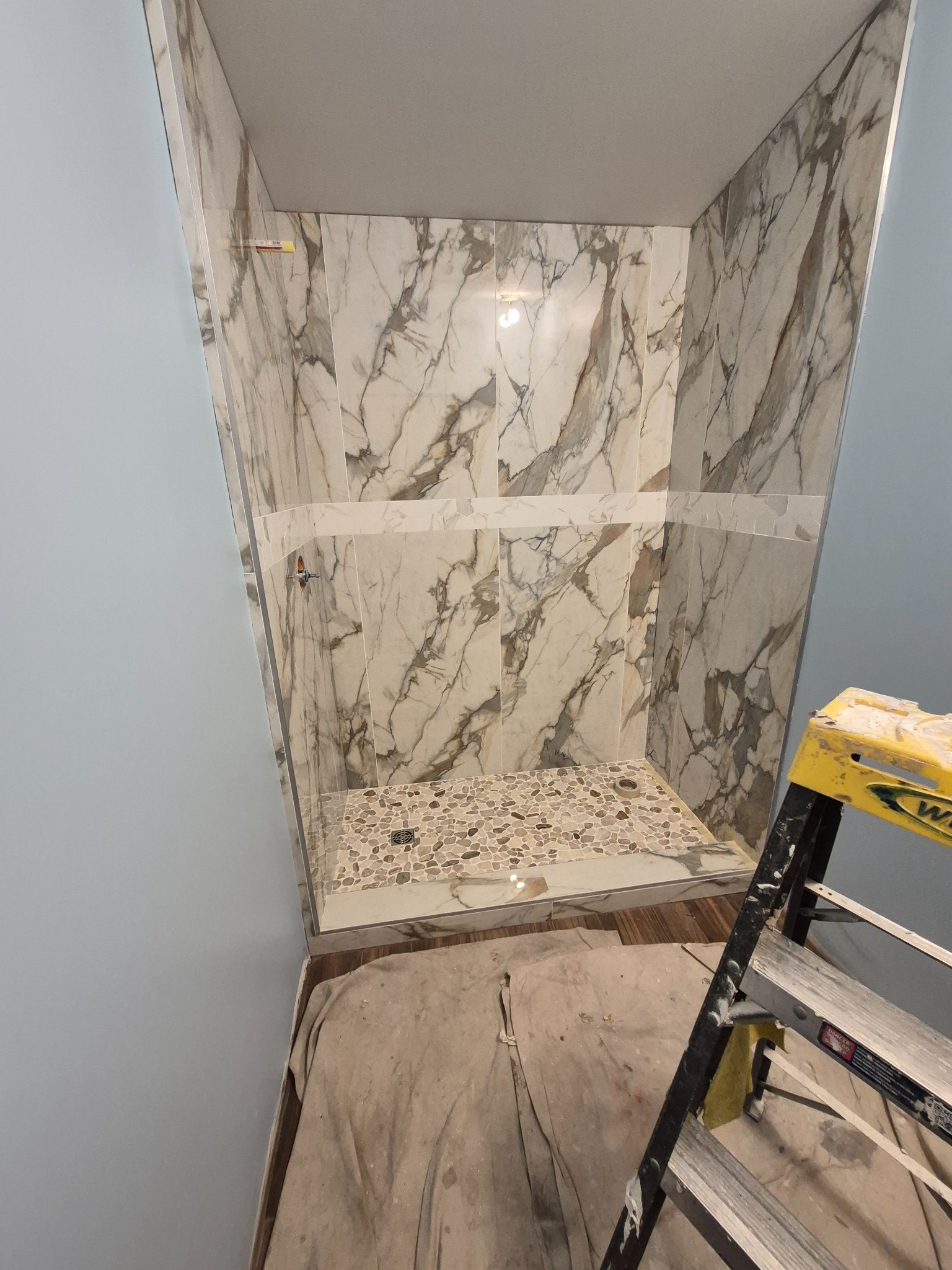 Marble-look tiled shower